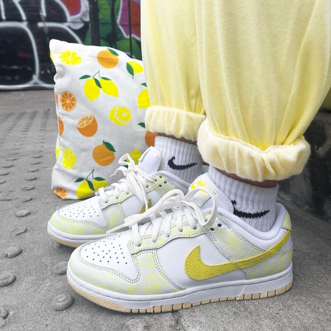 Nike yellow and white best sale