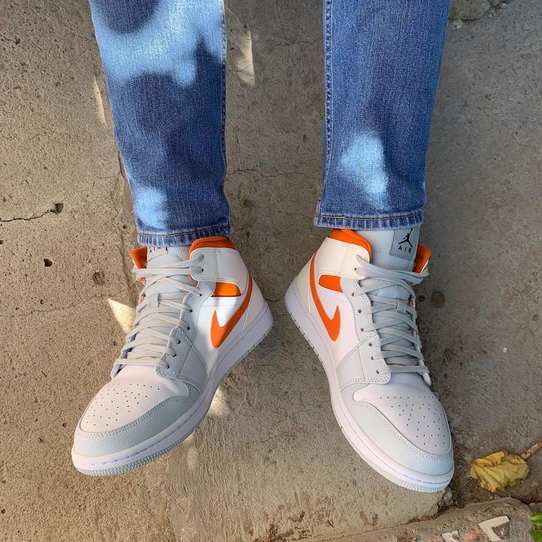 jordan 1 mid arctic orange on feet